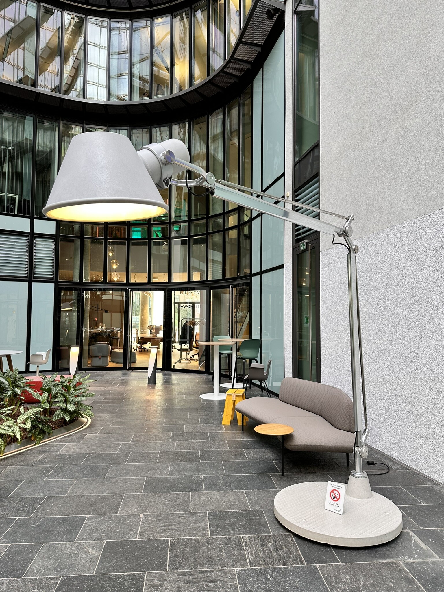 OHGIL design discovery featuring an architectural floor lamp in a courtyard