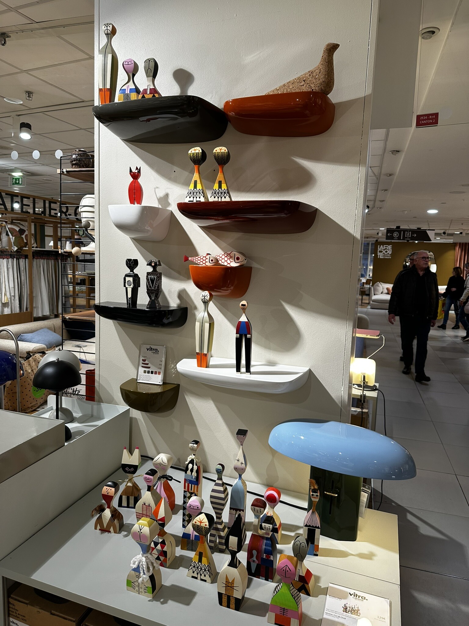 Colourful interior objects curated by OHGIL on display shelves